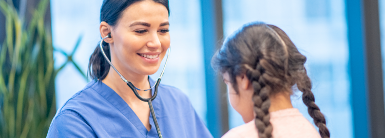 The school nurse checking on a sick student.