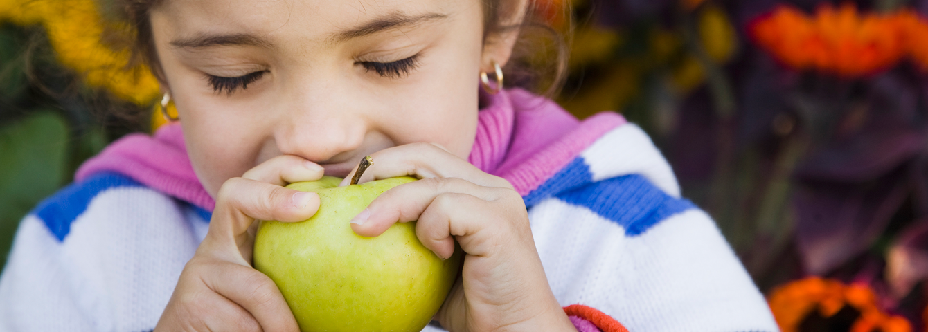 A student eating a healthy snack.